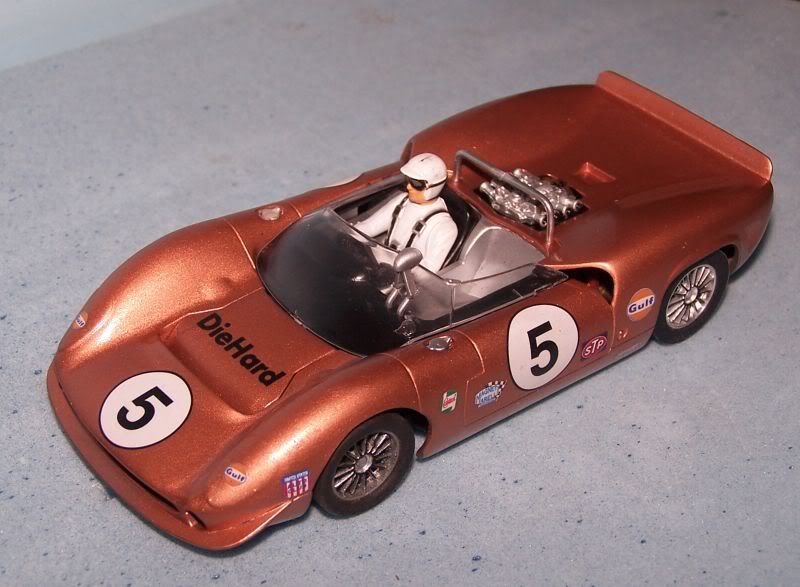 Slot car paint removal