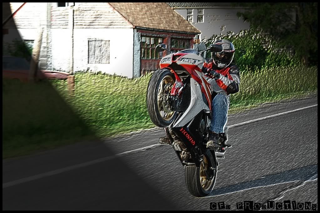 http://i193.photobucket.com/albums/z249/boycotchinawood/3%20wide%20wheelie%20pics/sitdown2.jpg