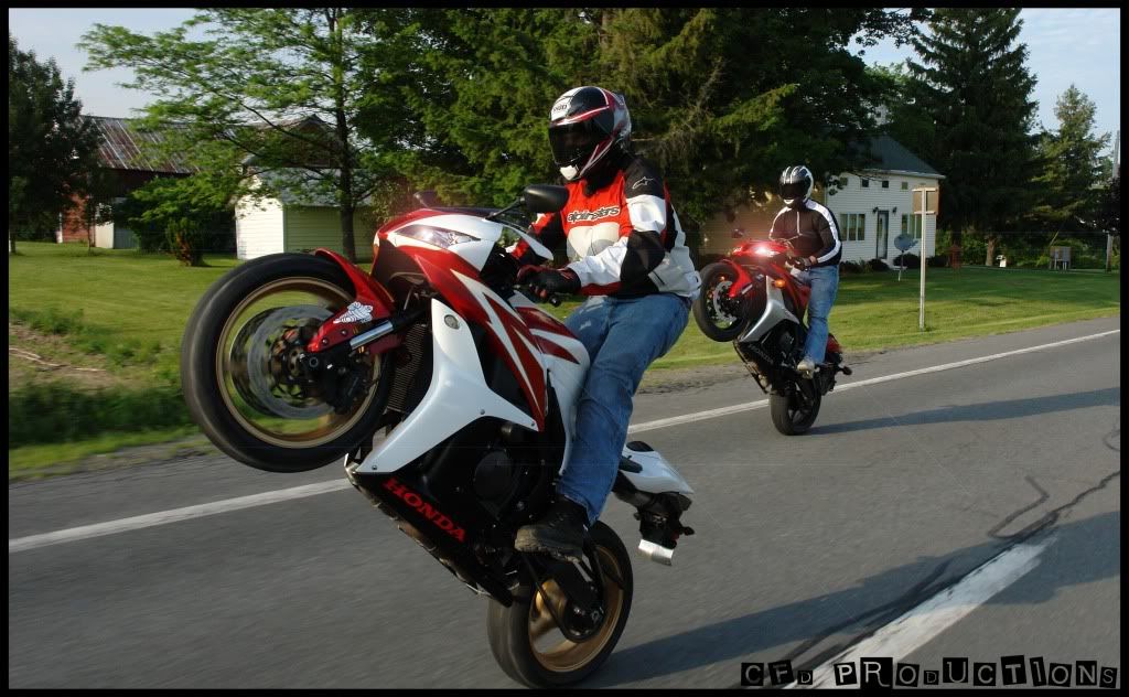 http://i193.photobucket.com/albums/z249/boycotchinawood/3%20wide%20wheelie%20pics/standup4.jpg