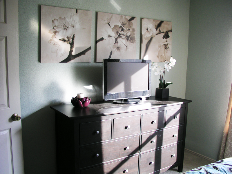 dresser with art and accessories